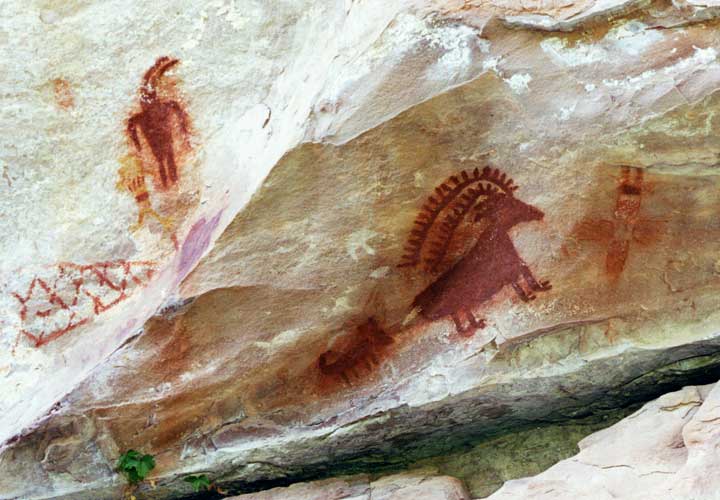 Petroglyphs of a sheep, dog, and owl
